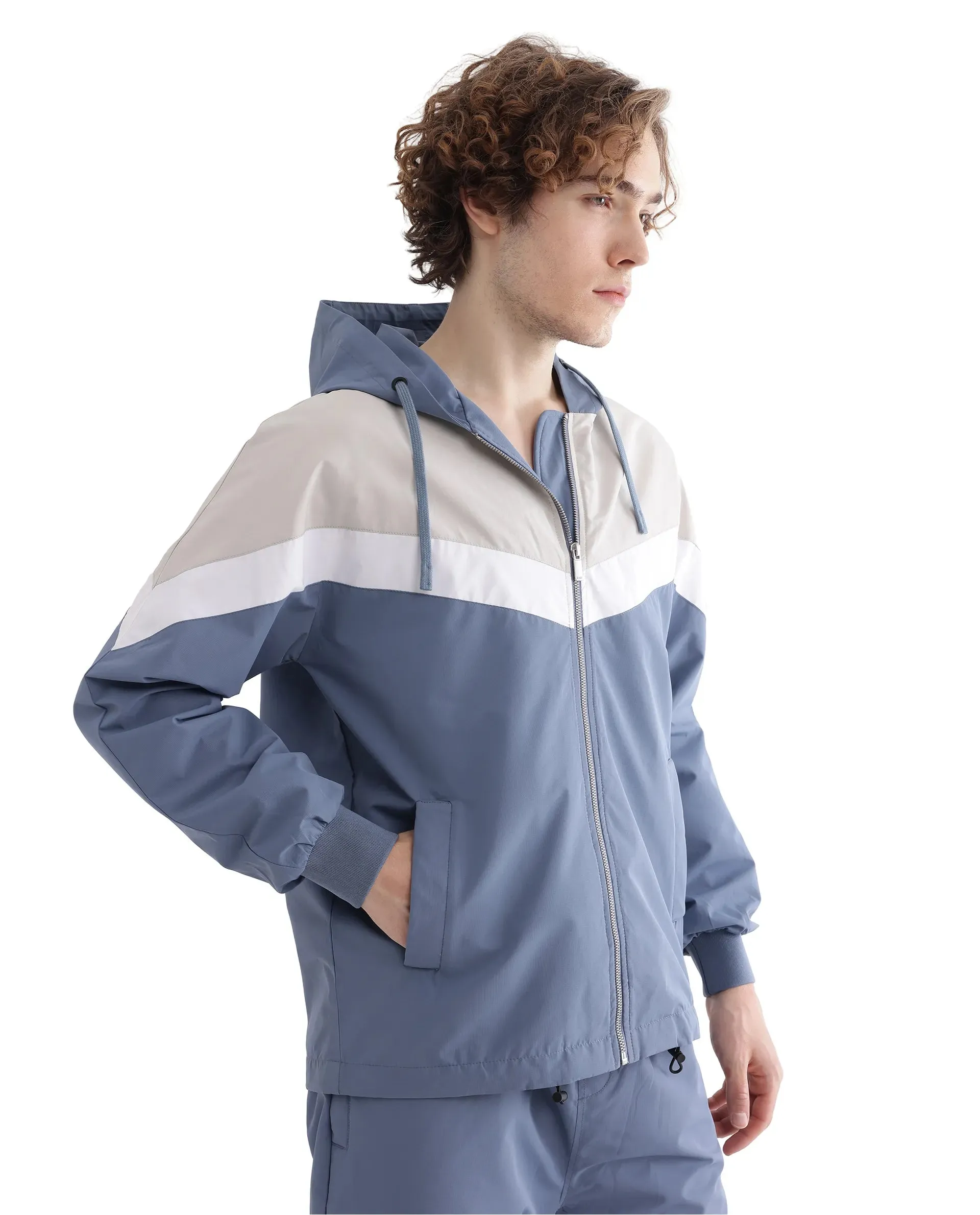 Rare Rabbit Men Waber Light Blue Polyester Fabric Full Sleeve Hooded Zipper Closure Cut and Sew Jacket